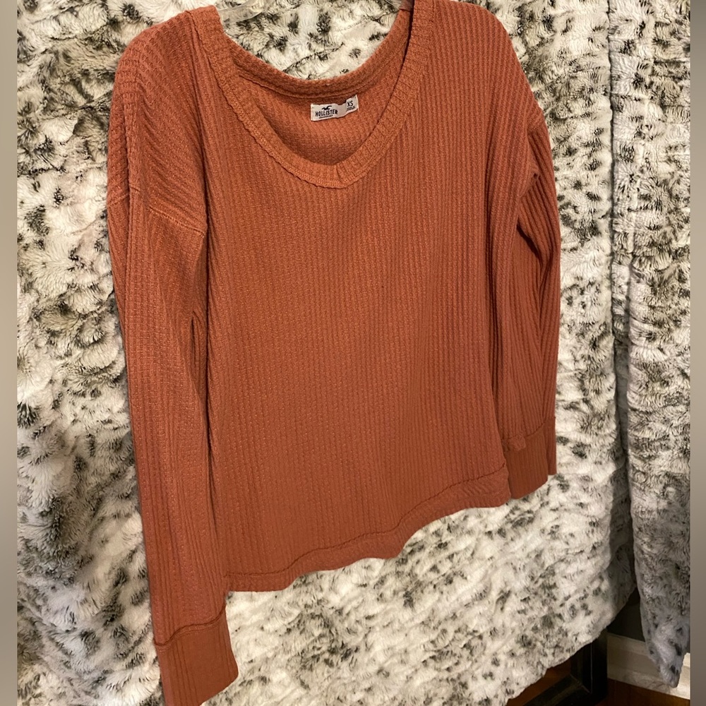orange long sleeve shirt